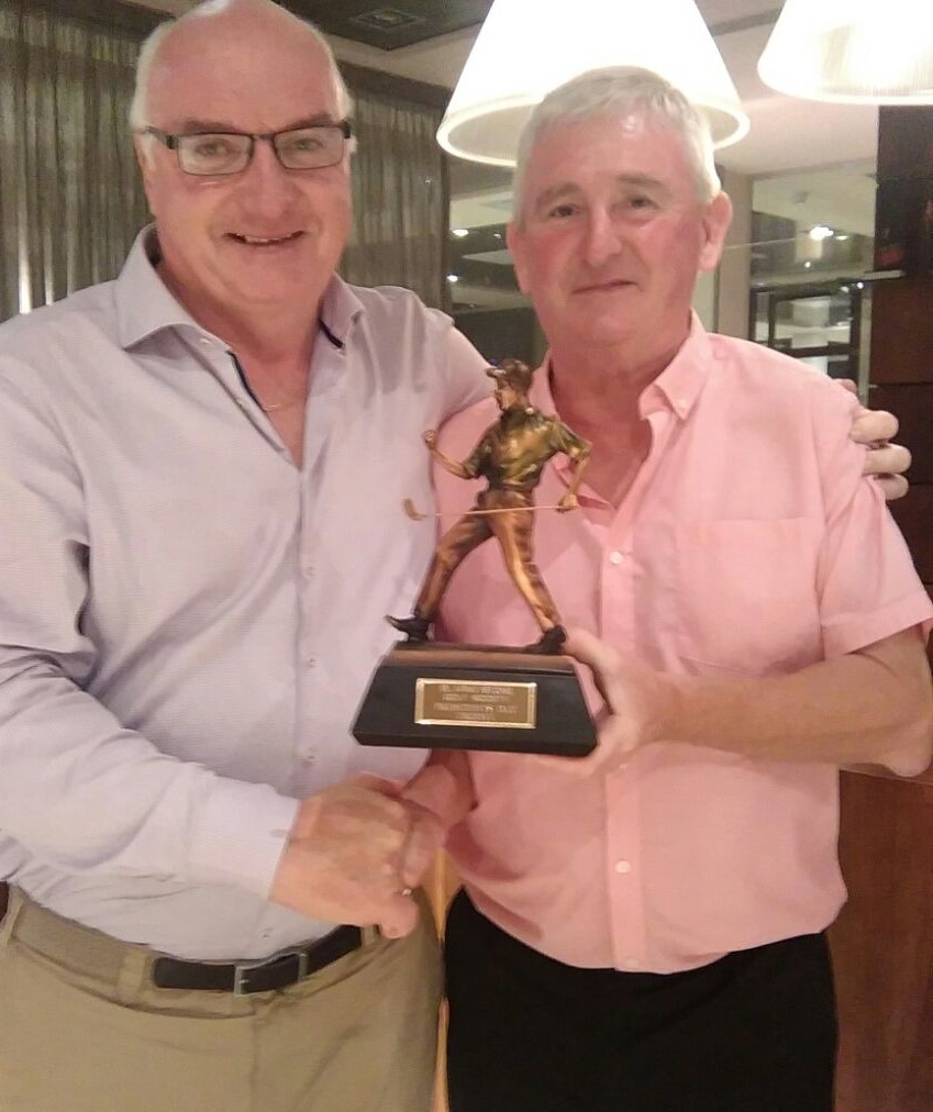 President Eamon Reilly and winner John Dynes