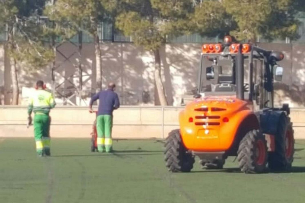 Work gets underway at the municipal stadium in Los Montesinos, Alicante, to replace the astro turf. Photo: Helen Atkinson.