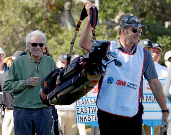 Clint Eastwood and his caddy Sir Nick Faldo.