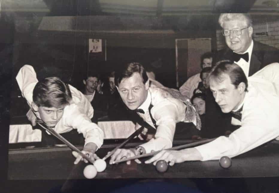 Drew Niblock (right) represented Northern Ireland at pool, pictured with Alex Higgins (centre).