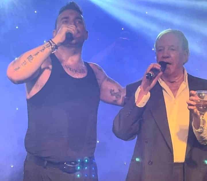 Tony Slater (right) with Robbie Williams Tribute star Tony Lewis at charity show.