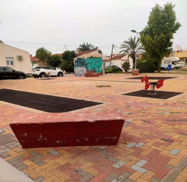 Park play area: slide and horse rides.